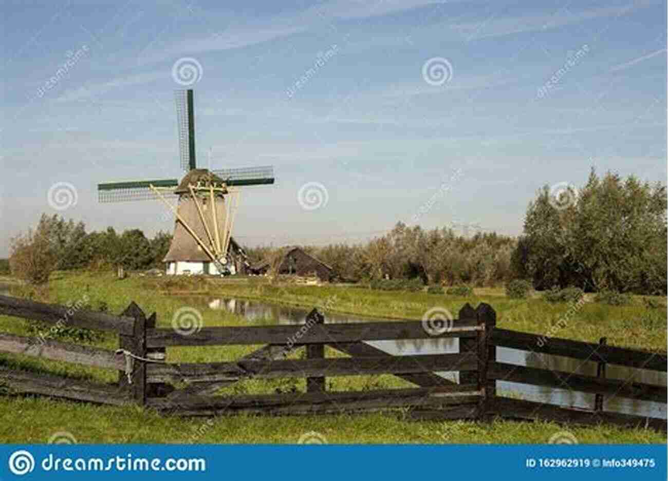 A Picturesque View Of A Traditional Windmill In The Netherlands, Surrounded By Vibrant Green Fields And Blue Sky Photo Essay: Beauty Of The Netherlands: Volume 62B (Travel Photo Essays)