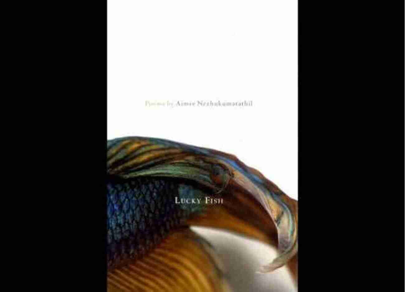 Aimee Nezhukumatathil Holding A Copy Of Lucky Fish Poems Lucky Fish: Poems Aimee Nezhukumatathil