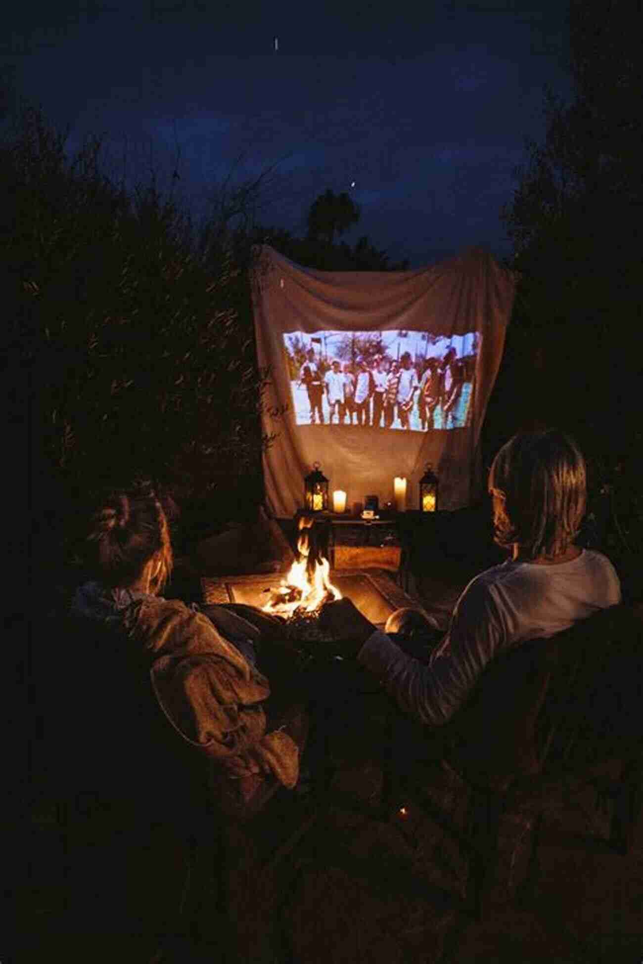 Couple Enjoying A Romantic Outdoor Movie Night Under The Stars 10 Great Dates Before You Say I Do