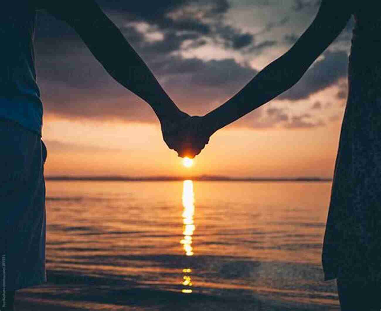 Couple Holding Hands On A Beach At Sunset Find Meet Marry The Person Of Your Dreams