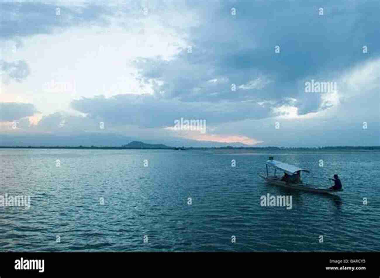 Rowing Into The Son: A Person Rowing Gently On A Calm Lake Surrounded By A Breathtaking Sunrise Rowing Into The Son: Four Young Men Crossing The North Atlantic