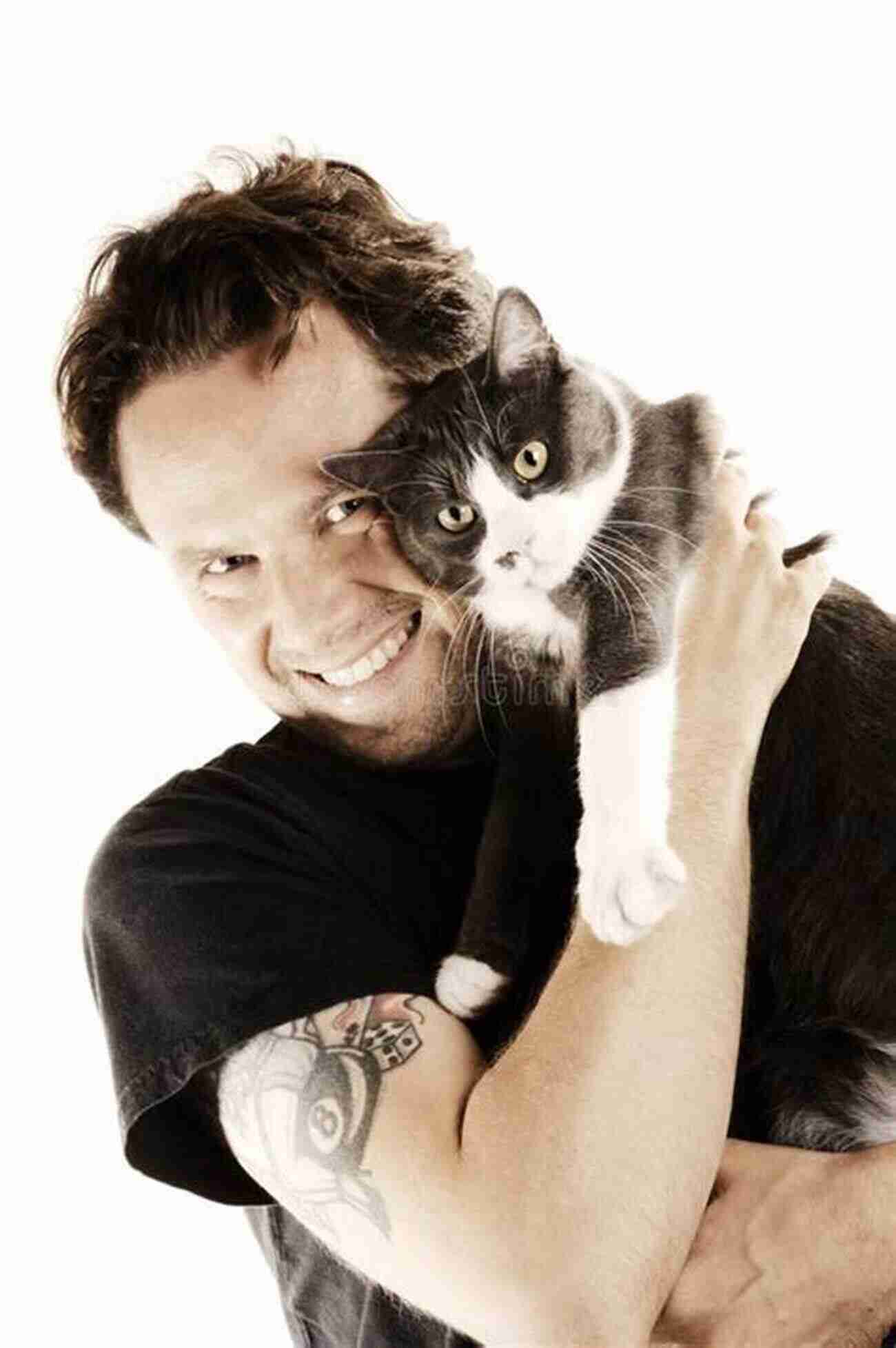 Strong And Confident Man Cuddling A Cute Cat Real Men Love Cats Nic Tatano